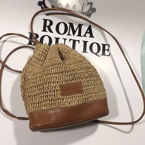 Enzo  Angiolini woven straw and leather backpack